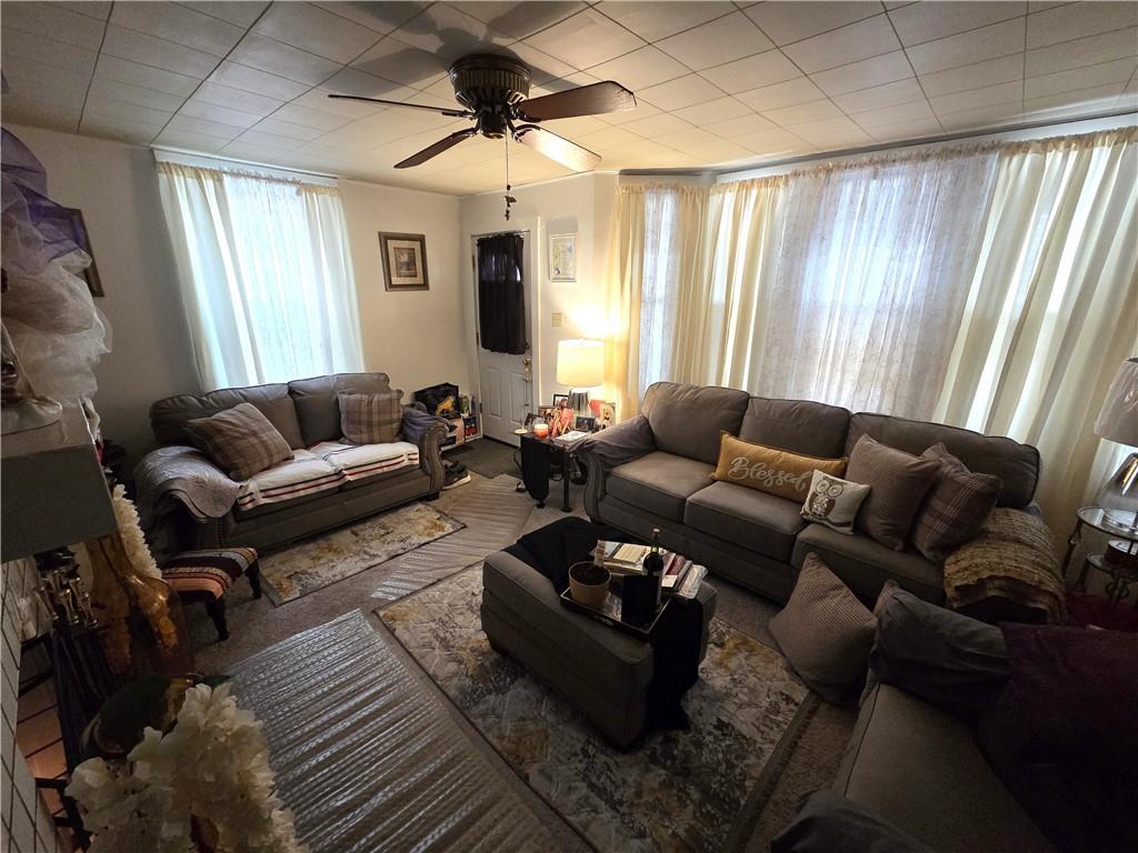 3520 Campus Street Pittsburgh, PA 15212 - Photo 19 of 26 a living room with furniture and a large window