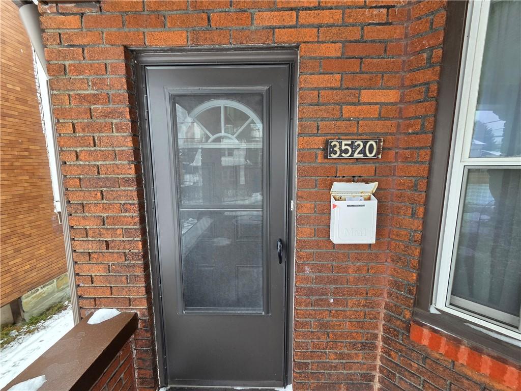 3520 Campus Street Pittsburgh, PA 15212 - Photo 6 of 26 a front view of a house with a door