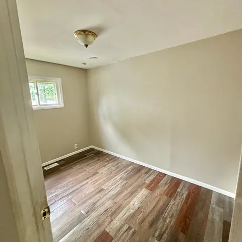 a bathroom with a sink a toilet and bathtub