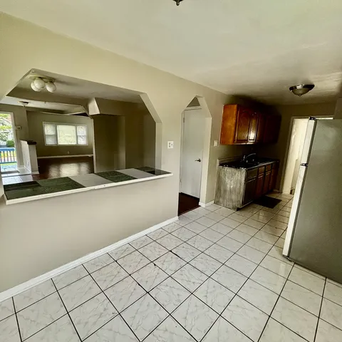 a view of a hallway with windows