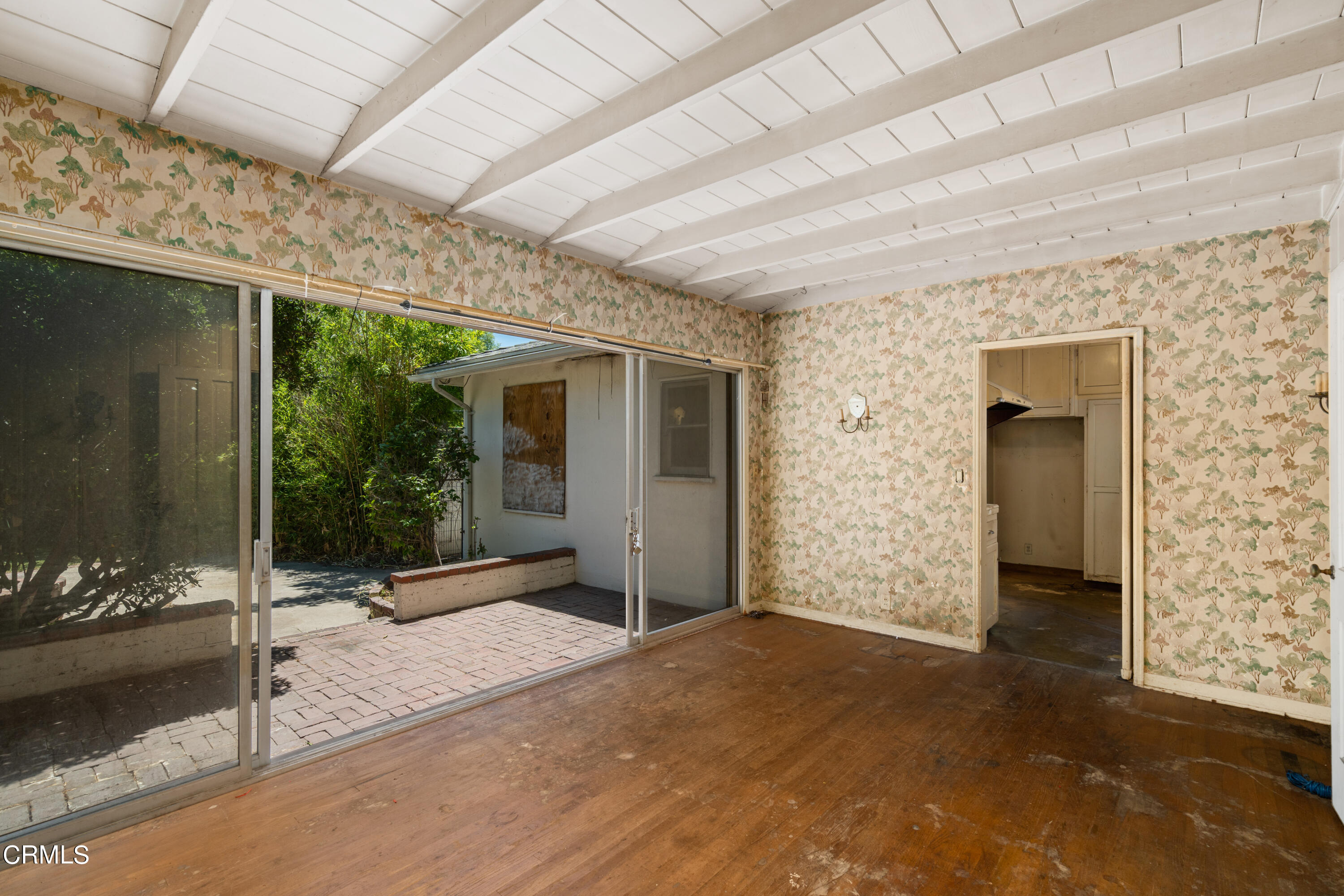 3254 Orlando Road Pasadena, CA 91107 - Photo 12 of 25 a view of a porch with a table and chairs and potted plants