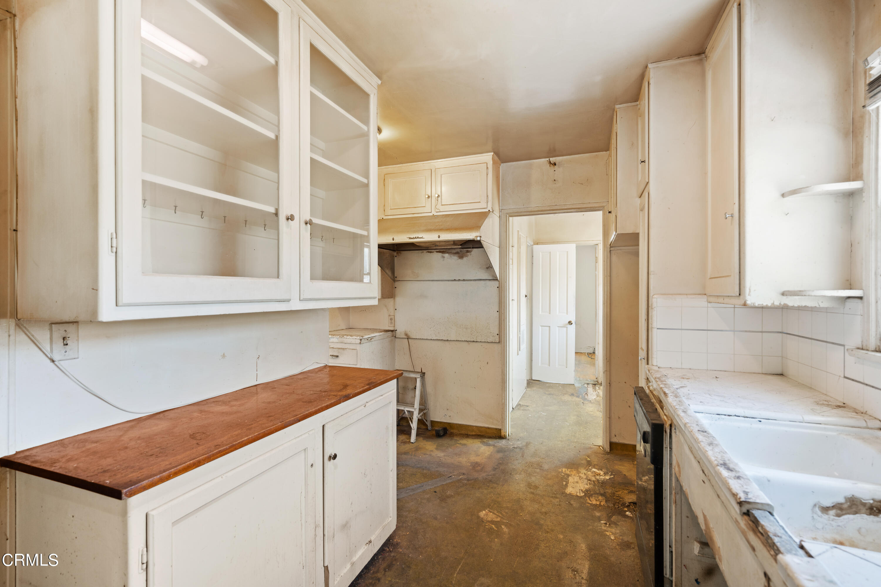 3254 Orlando Road Pasadena, CA 91107 - Photo 15 of 25 a kitchen with a sink and a refrigerator