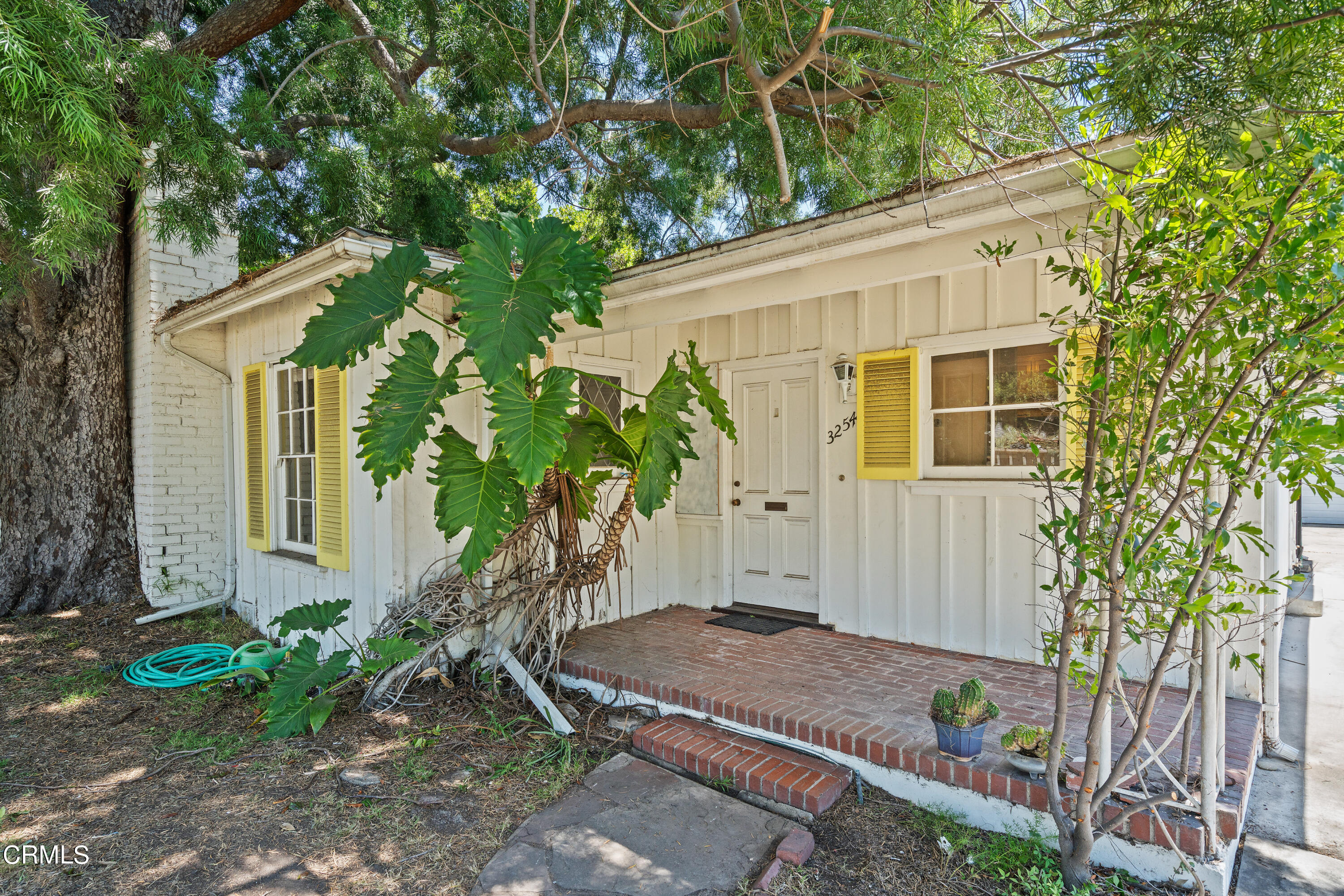 3254 Orlando Road Pasadena, CA 91107 - Photo 7 of 25 a house with a tree in front of it