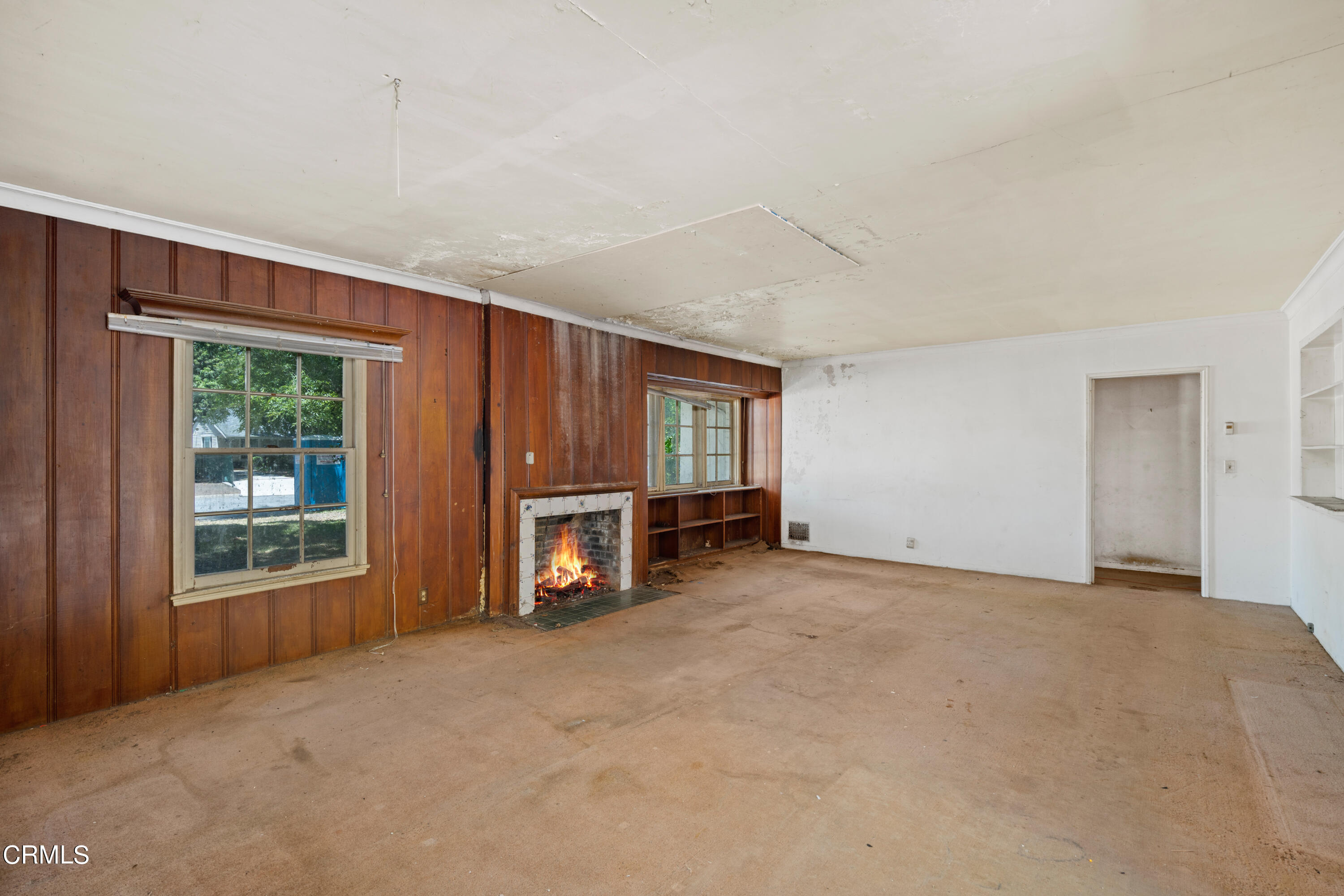 3254 Orlando Road Pasadena, CA 91107 - Photo 9 of 25 an empty room with furniture and a window