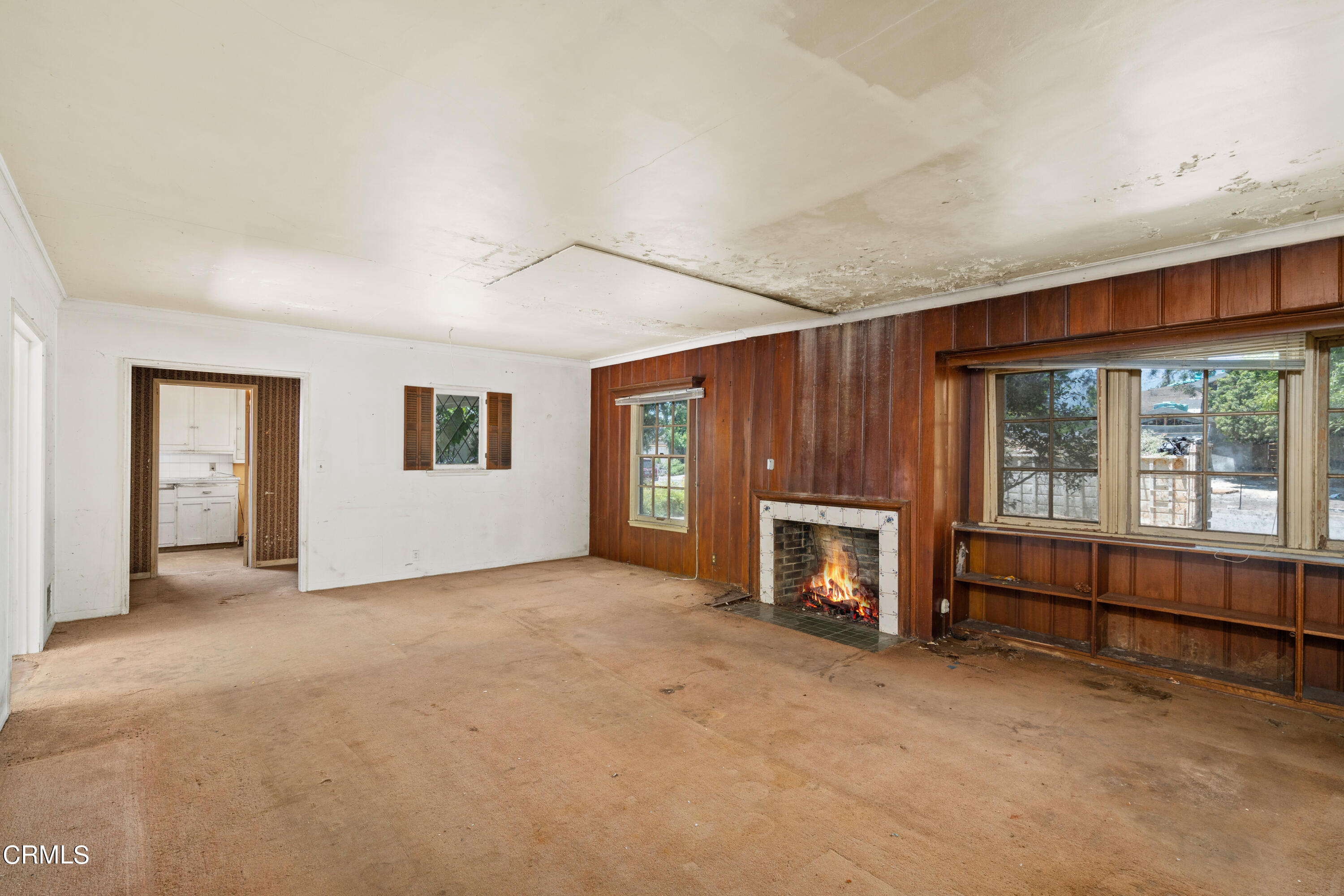3254 Orlando Road Pasadena, CA 91107 - Photo 10 of 25 an empty room with furniture and fireplace