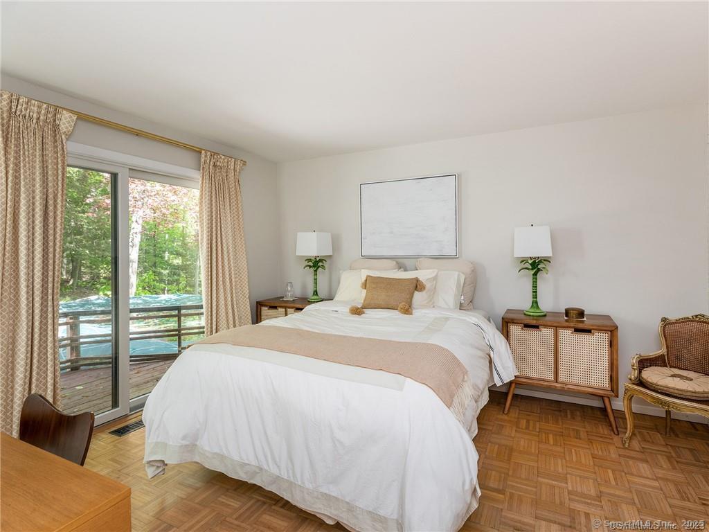 95 Shinar Mountain Road Washington, CT 06794 - Photo 15 of 27 a bedroom with a bed and a large window