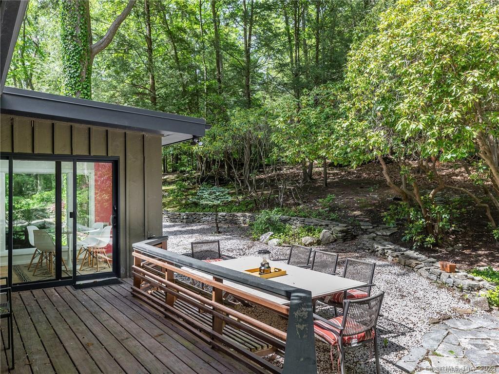 95 Shinar Mountain Road Washington, CT 06794 - Photo 17 of 27 a view of backyard with a patio and wooden floor