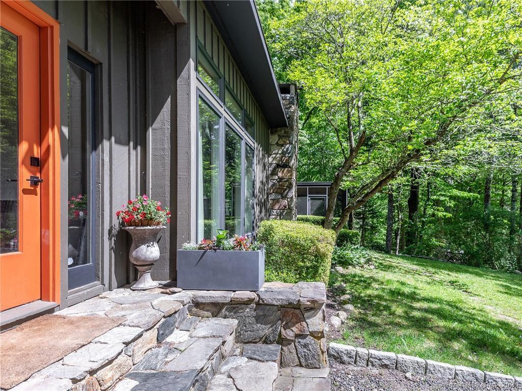 95 Shinar Mountain Road Washington, CT 06794 - Photo 25 of 27 a view of a house with backyard and garden