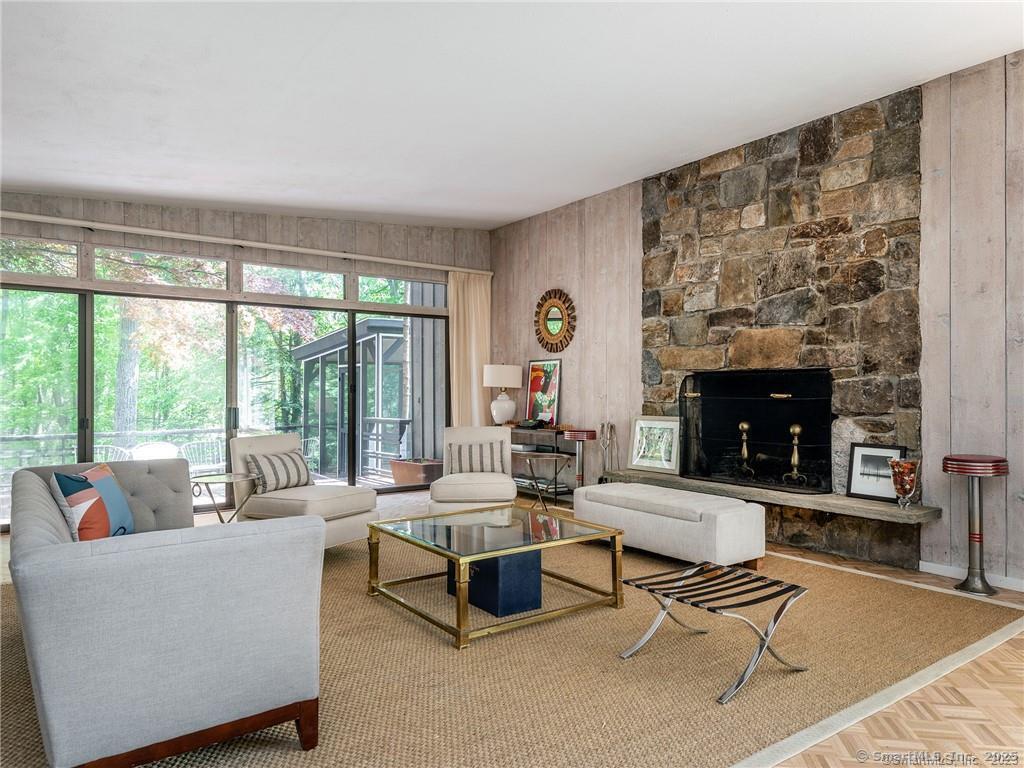 95 Shinar Mountain Road Washington, CT 06794 - Photo 4 of 27 a living room with furniture and a fireplace