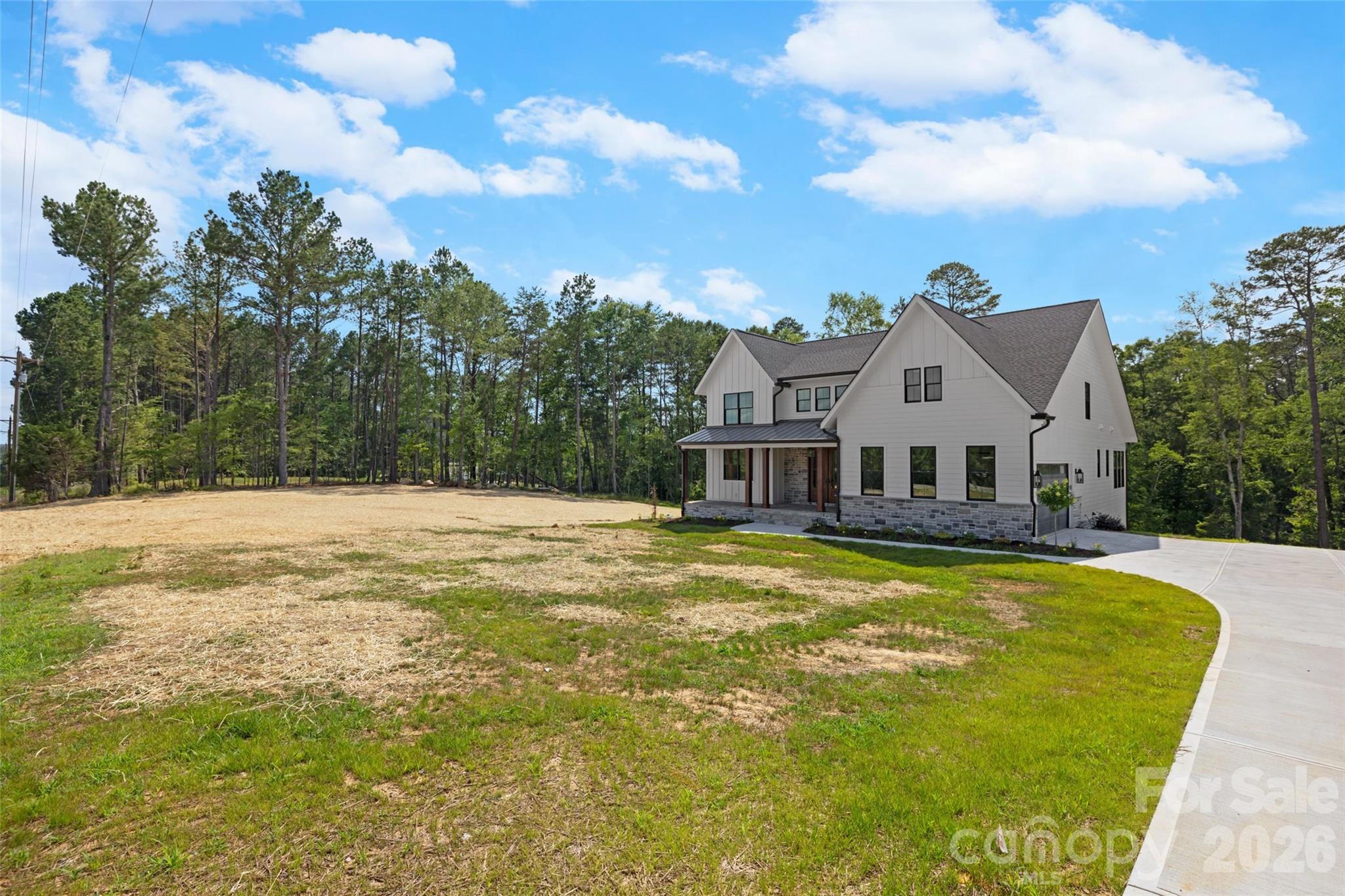 537 Riddle Mill Road Clover, SC 29710 - Photo 44 of 46 a view of a house with pool and sitting area