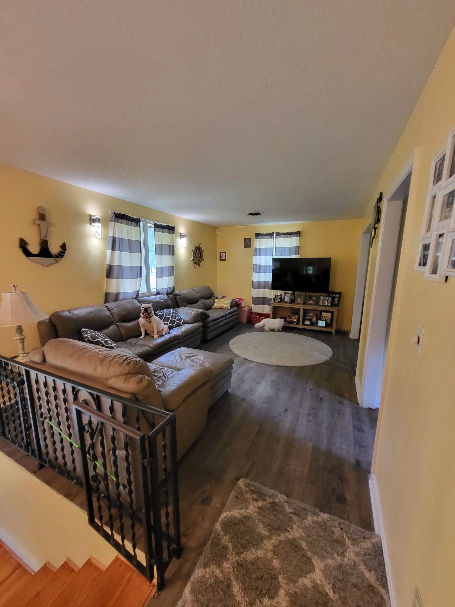 1393 Pomona Road Dickson, TN 37055 - Photo 15 of 32 a living room with furniture and a wooden floor