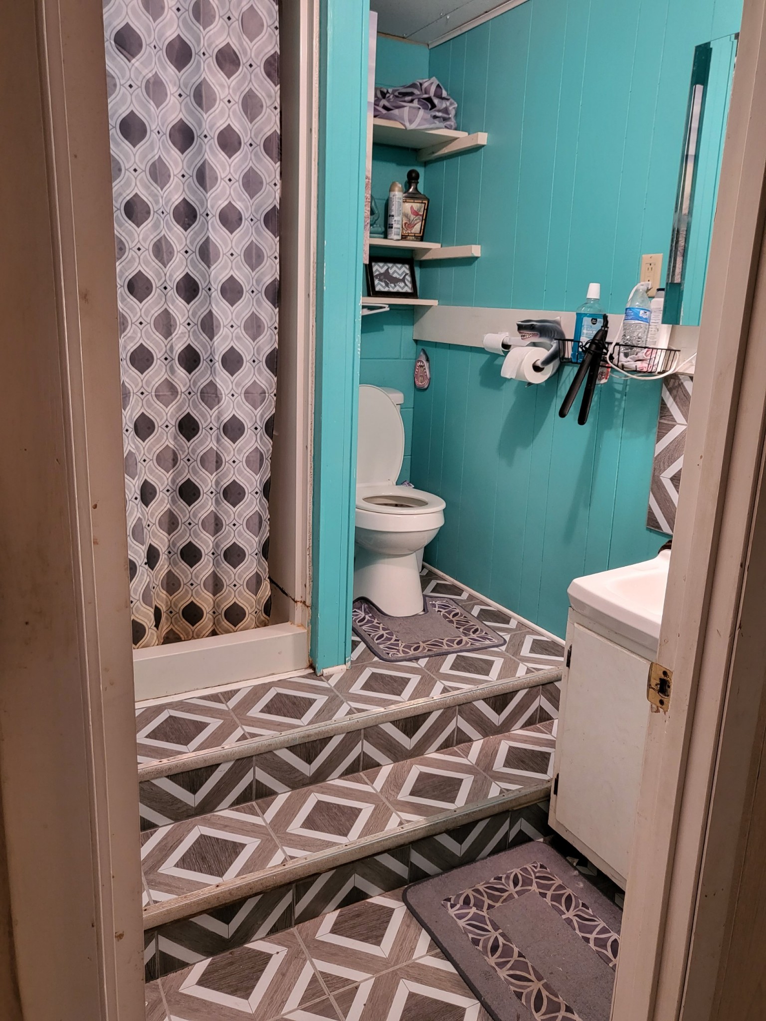 1393 Pomona Road Dickson, TN 37055 - Photo 23 of 32 a bathroom with a sink and toilet