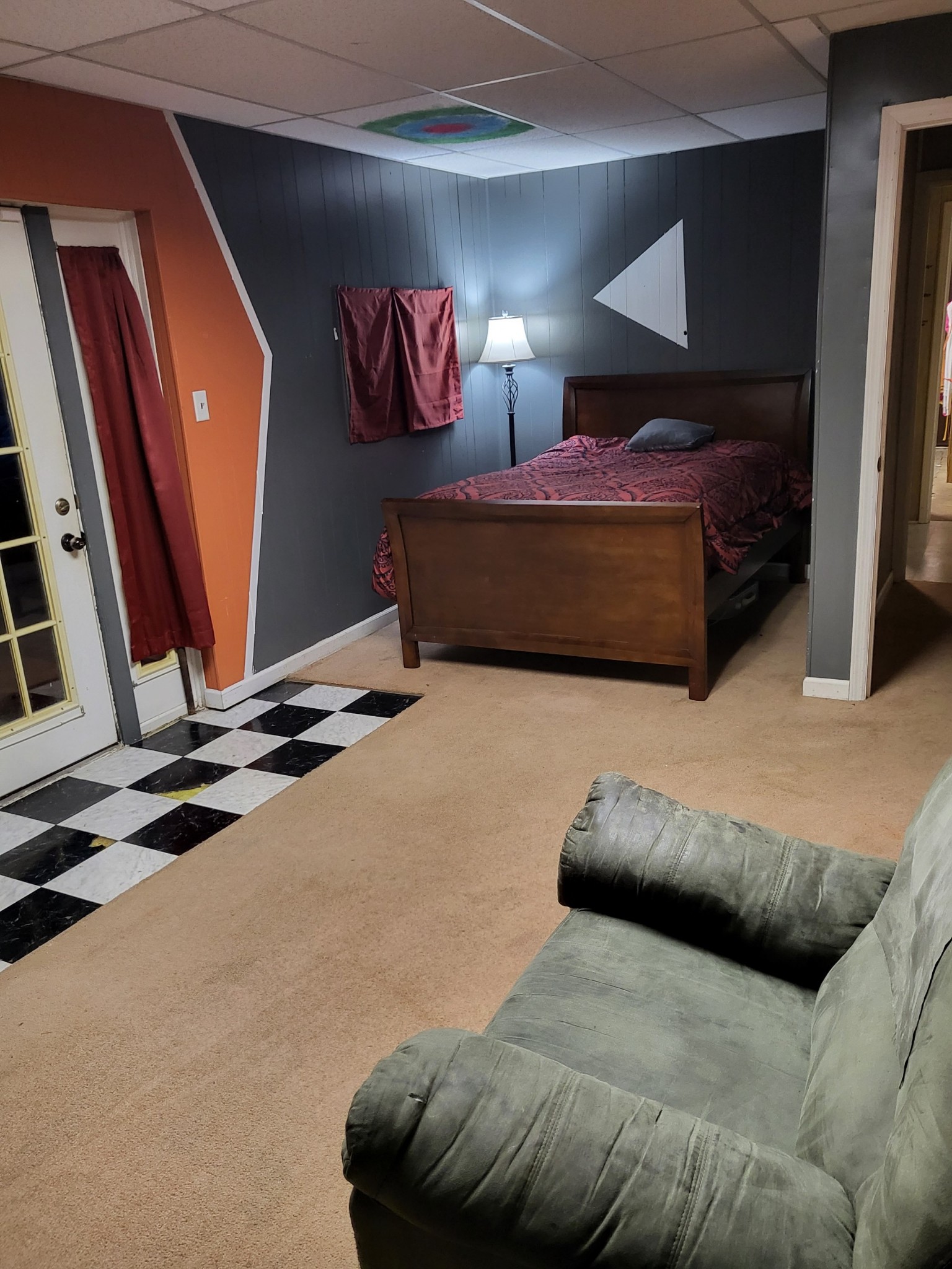 1393 Pomona Road Dickson, TN 37055 - Photo 24 of 32 a bedroom with a bed and a flat tv screen