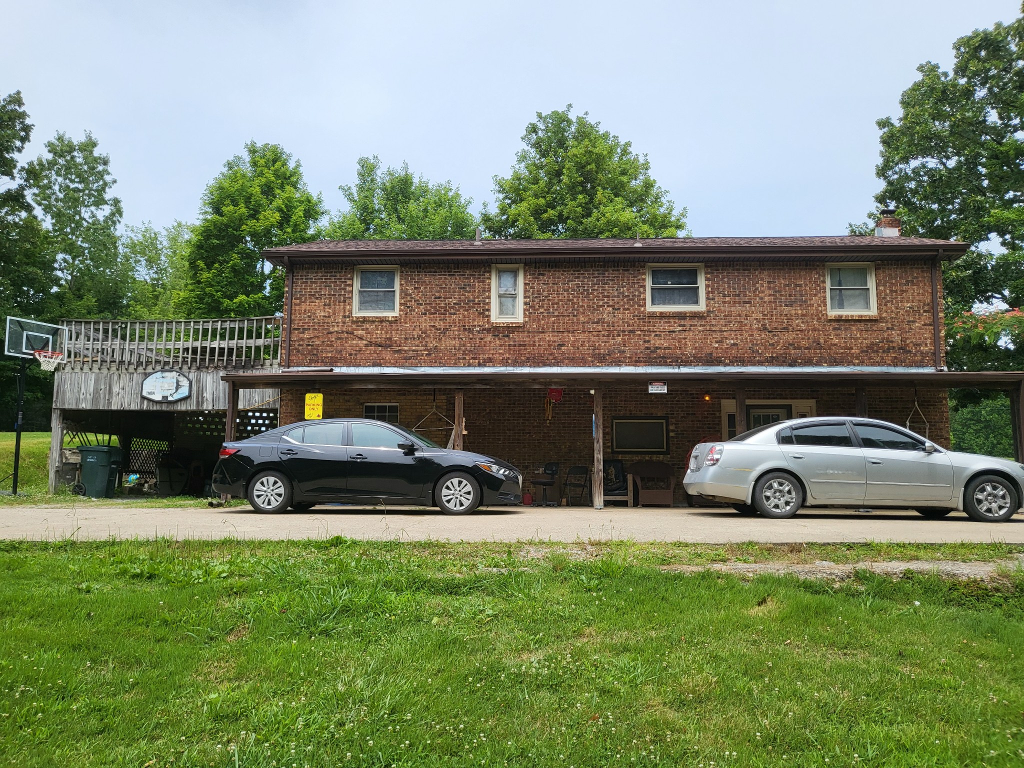 1393 Pomona Road Dickson, TN 37055 - Photo 5 of 32 a view of a car parked in front of a house