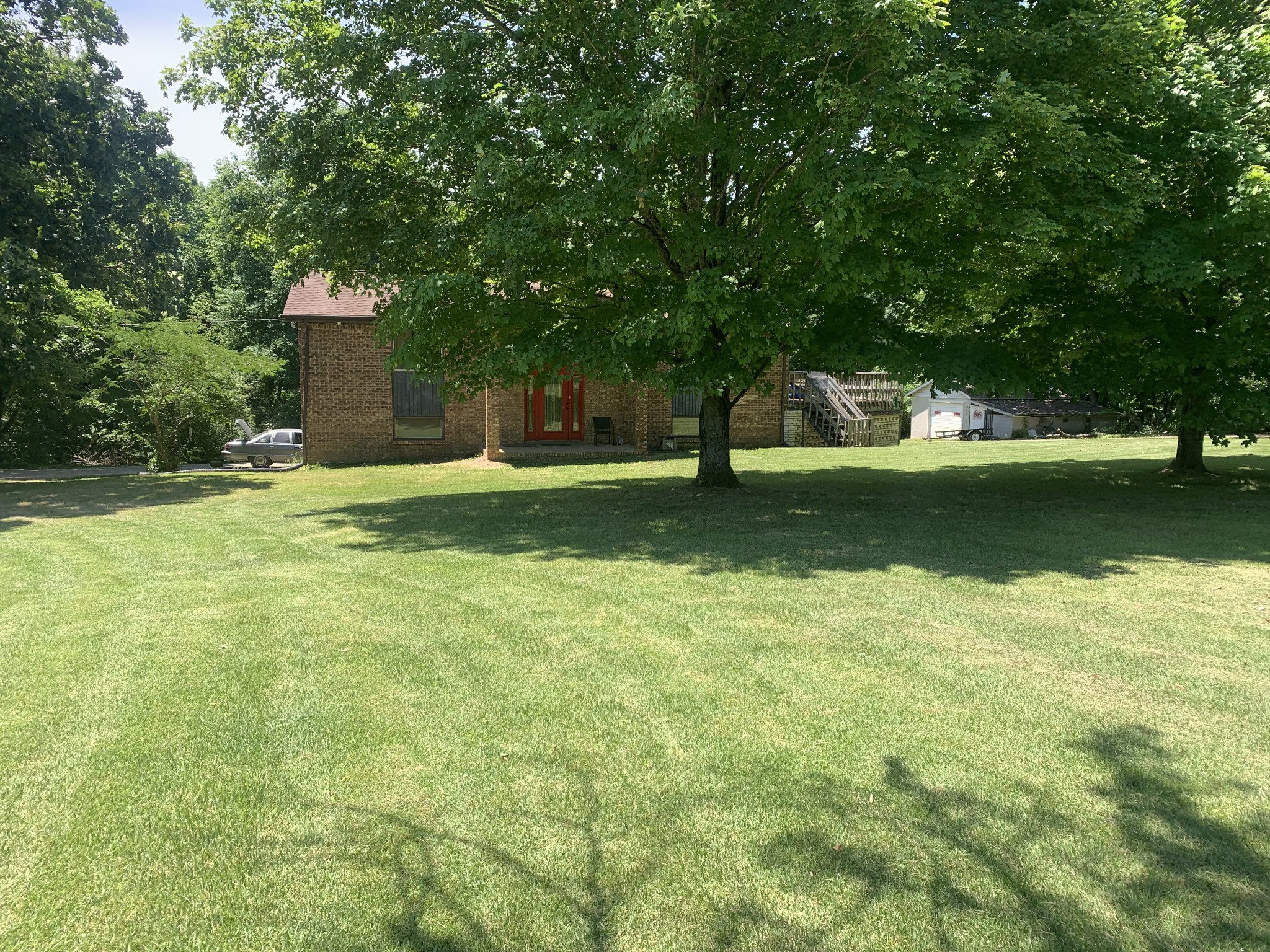 1393 Pomona Road Dickson, TN 37055 - Photo 8 of 32 a house view with a garden space