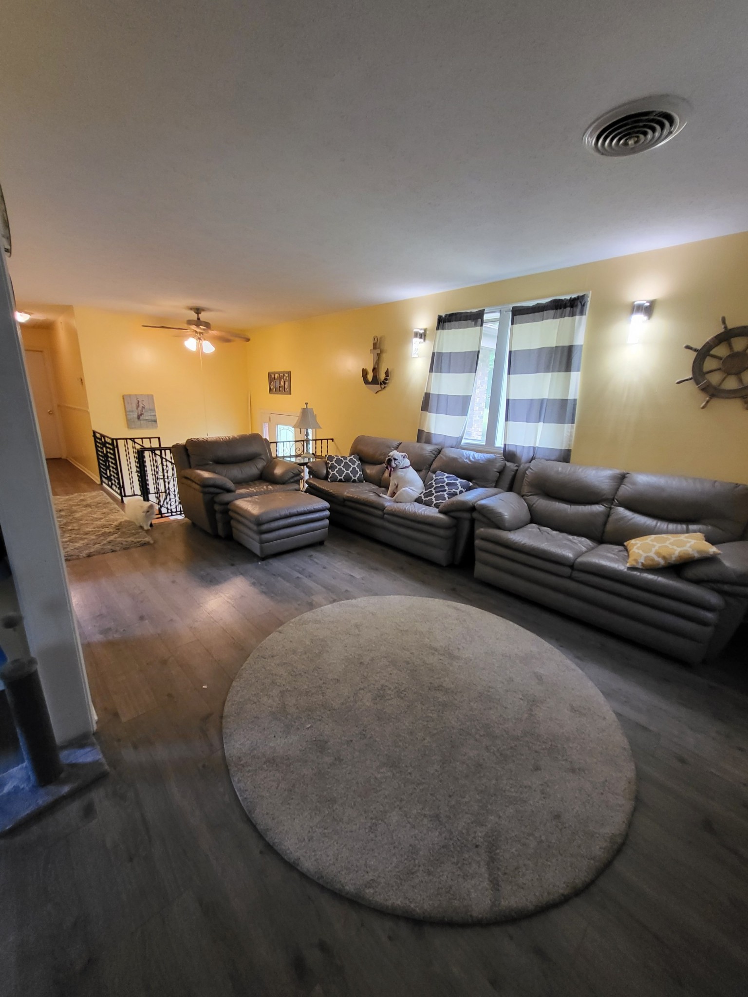 1393 Pomona Road Dickson, TN 37055 - Photo 9 of 32 a living room with furniture and a couch