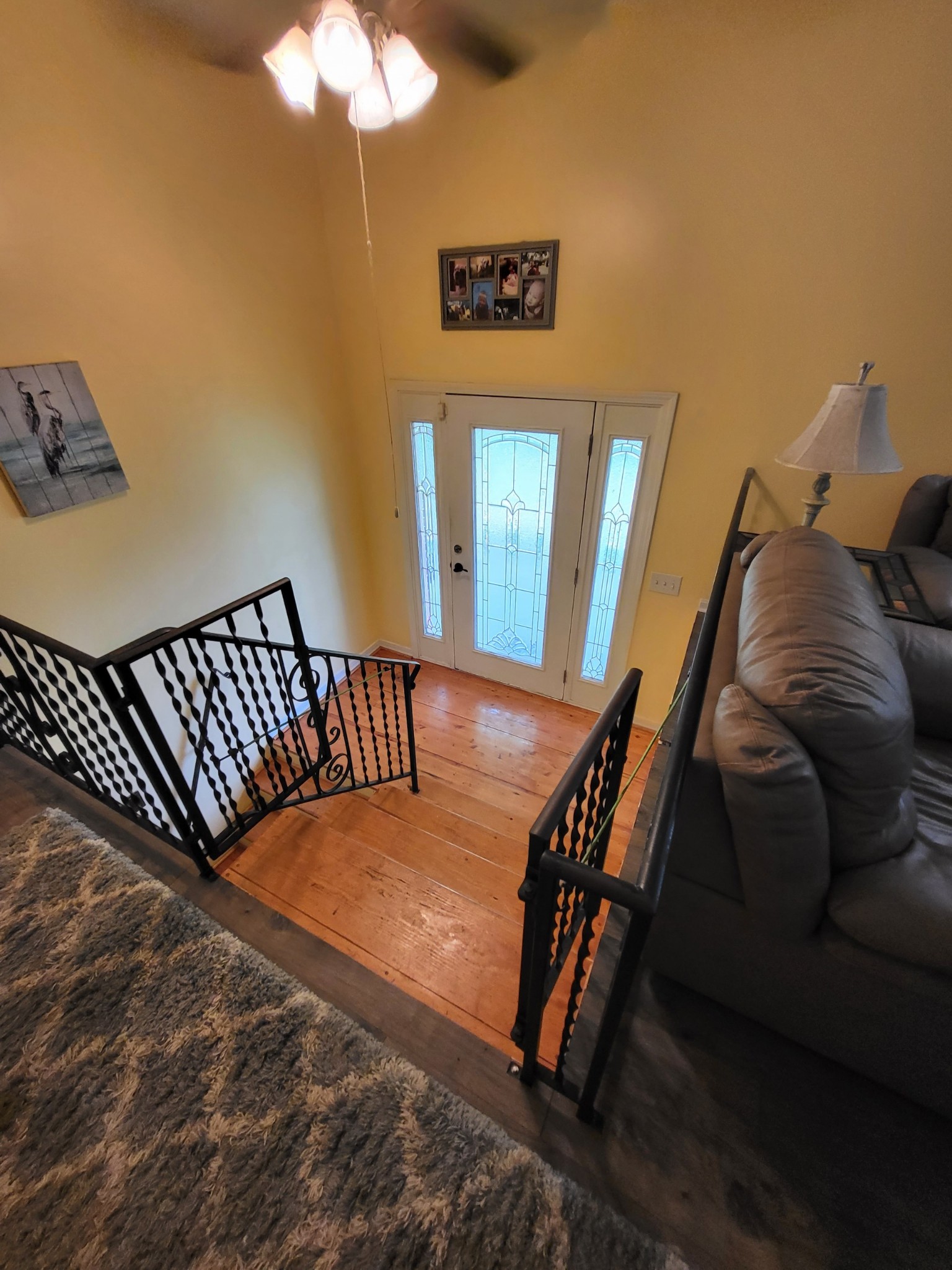 1393 Pomona Road Dickson, TN 37055 - Photo 10 of 32 a view of a bedroom with furniture and wooden floor