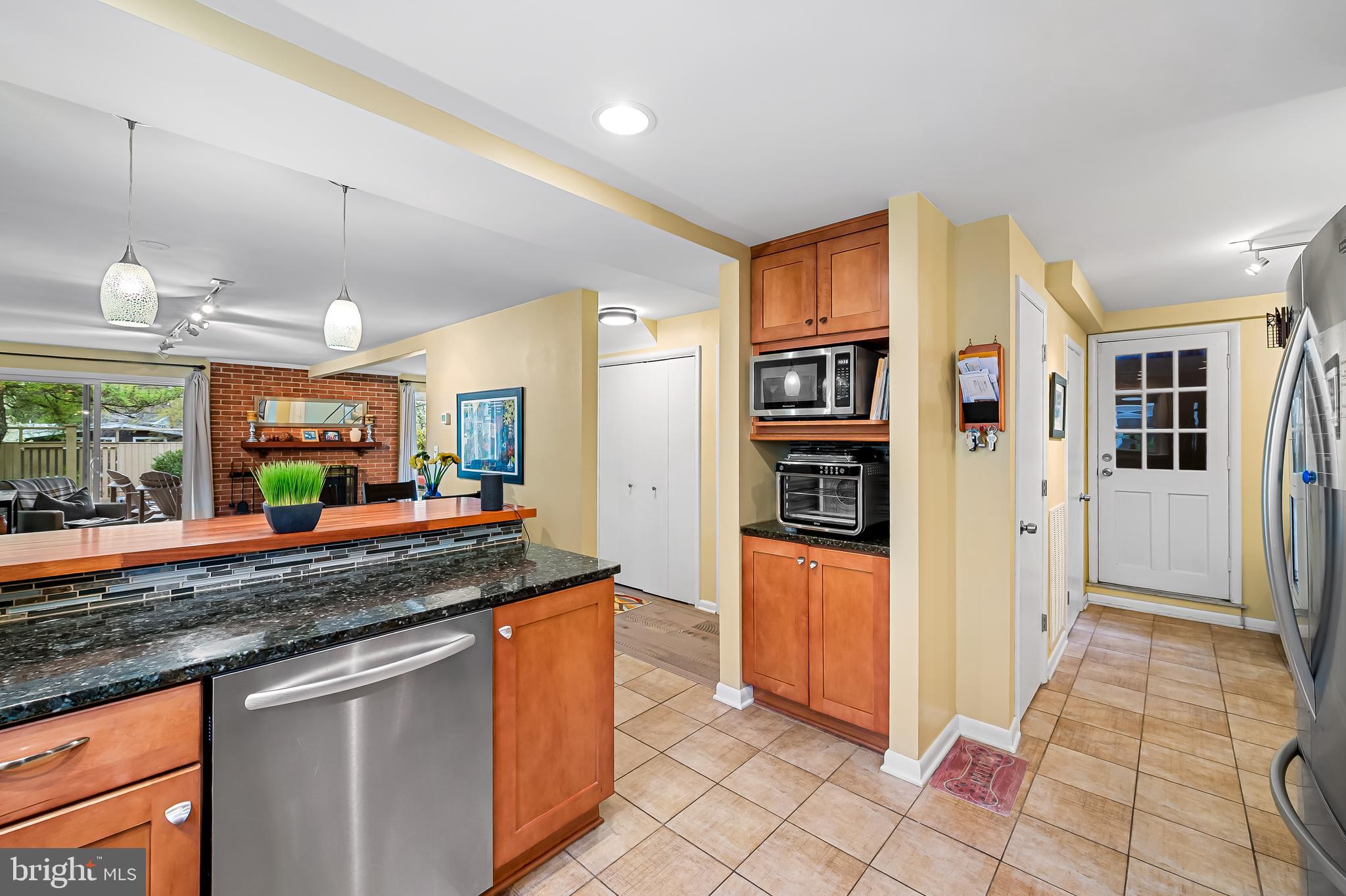 805 Litchfield Road Baltimore, MD 21239 - Photo 8 of 36 a kitchen with stainless steel appliances granite countertop a refrigerator and a sink