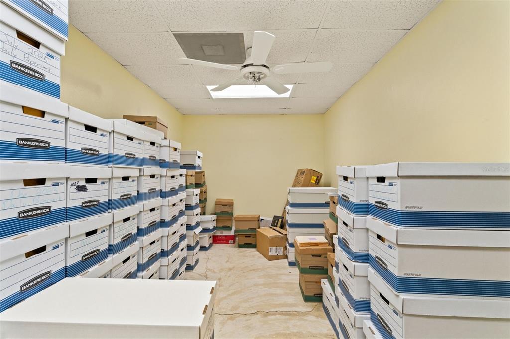 1108 Commercial Way Spring Hill, FL 34606 - Photo 10 of 17 a view of a room with cabinet and mirrors