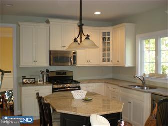 210 Middletown Road Media, PA 19063 - Photo 4 of 11 a kitchen with a sink a microwave a stove and refrigerator