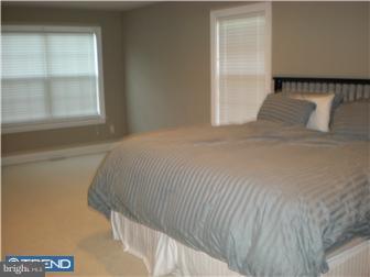210 Middletown Road Media, PA 19063 - Photo 7 of 11 a bedroom with a bed and window