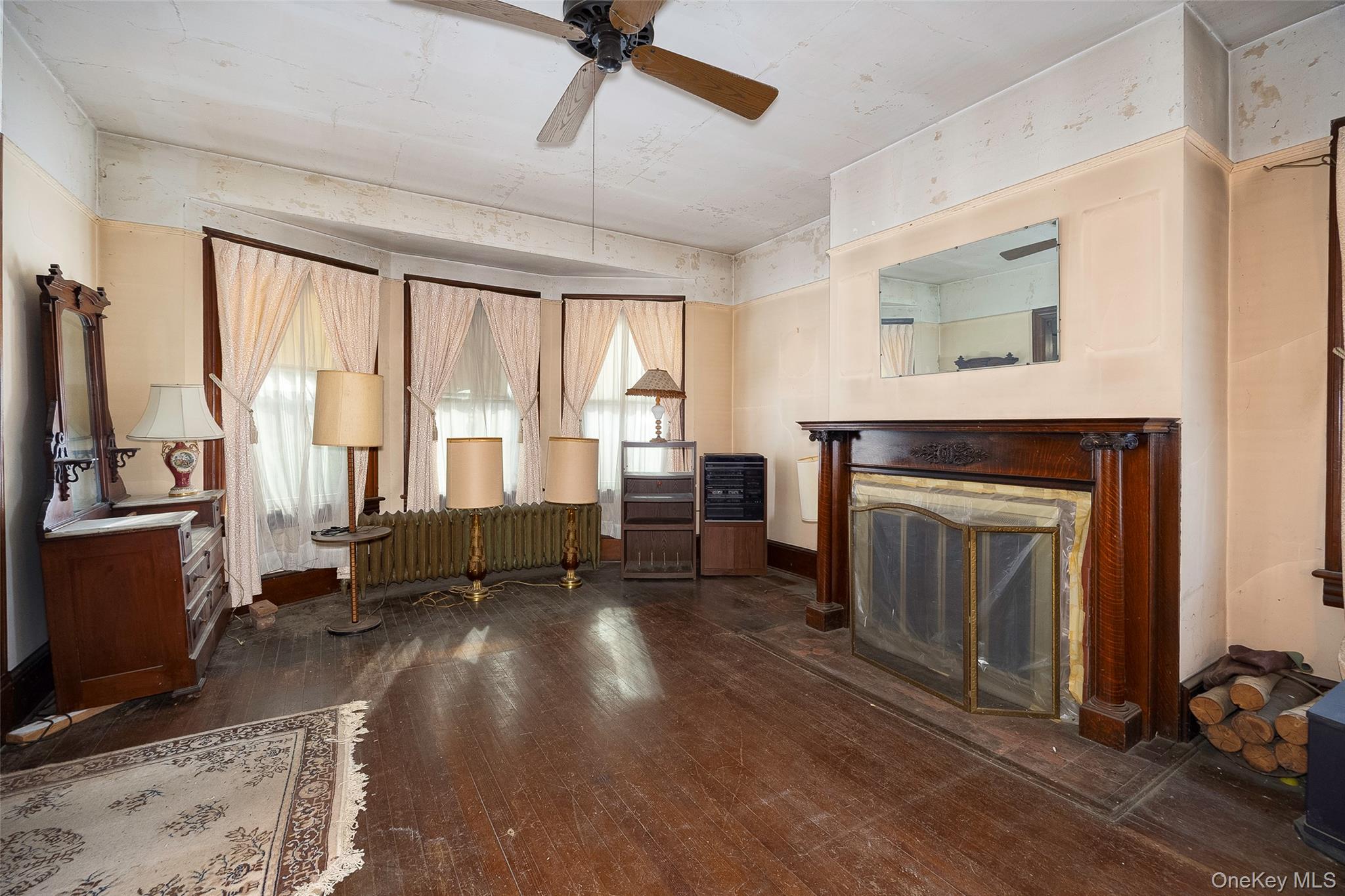 3 Spring Street Chelsea, NY 12590 - Photo 17 of 39 a living room with furniture and a fireplace