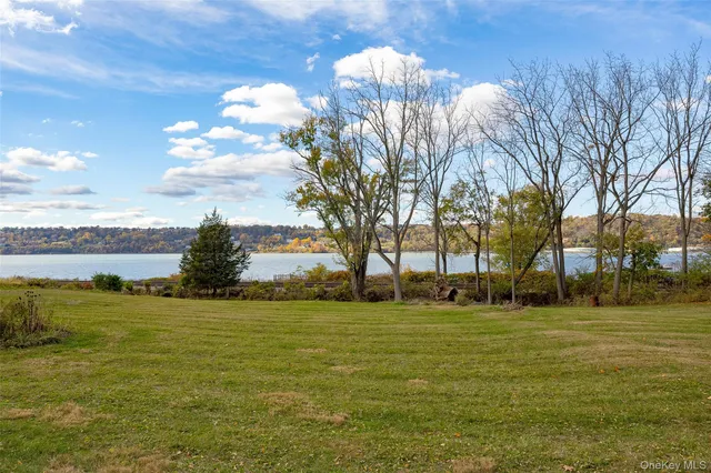 a view of a pool with an ocean view