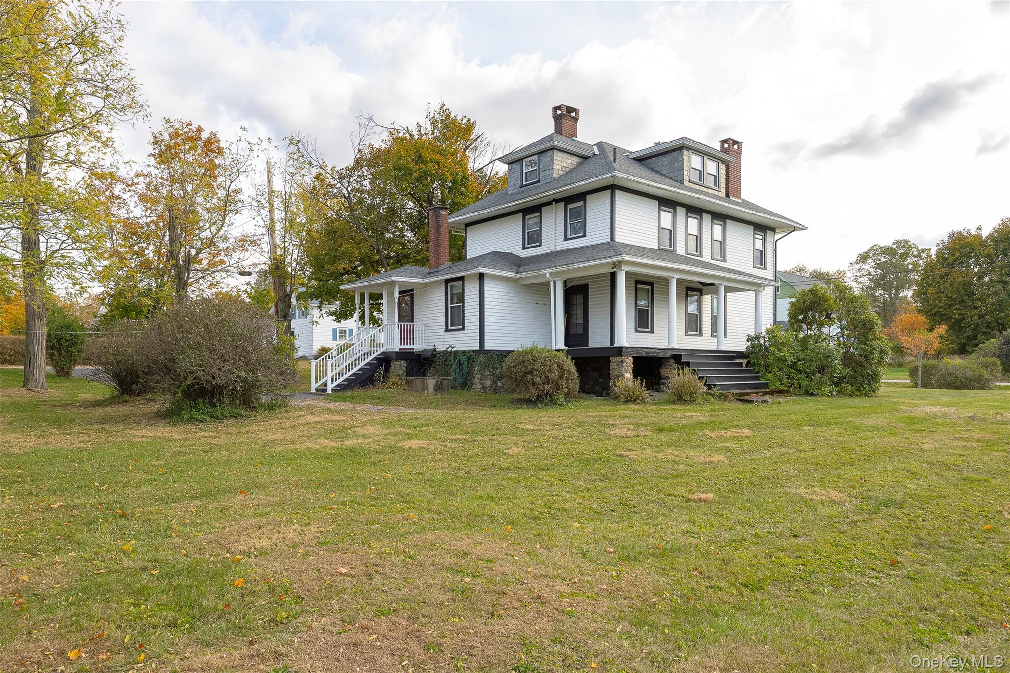 3 Spring Street Chelsea, NY 12590 - Photo 9 of 39 a view of a house with a big yard and large trees