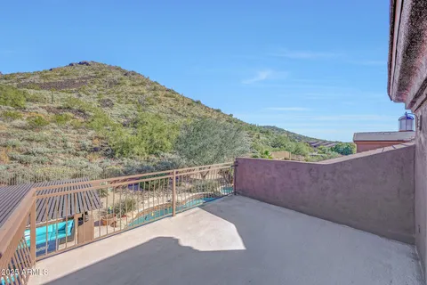 an aerial view of residential houses with outdoor space and street view