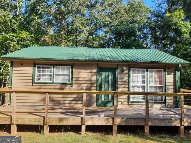 front view of a house with a balcony