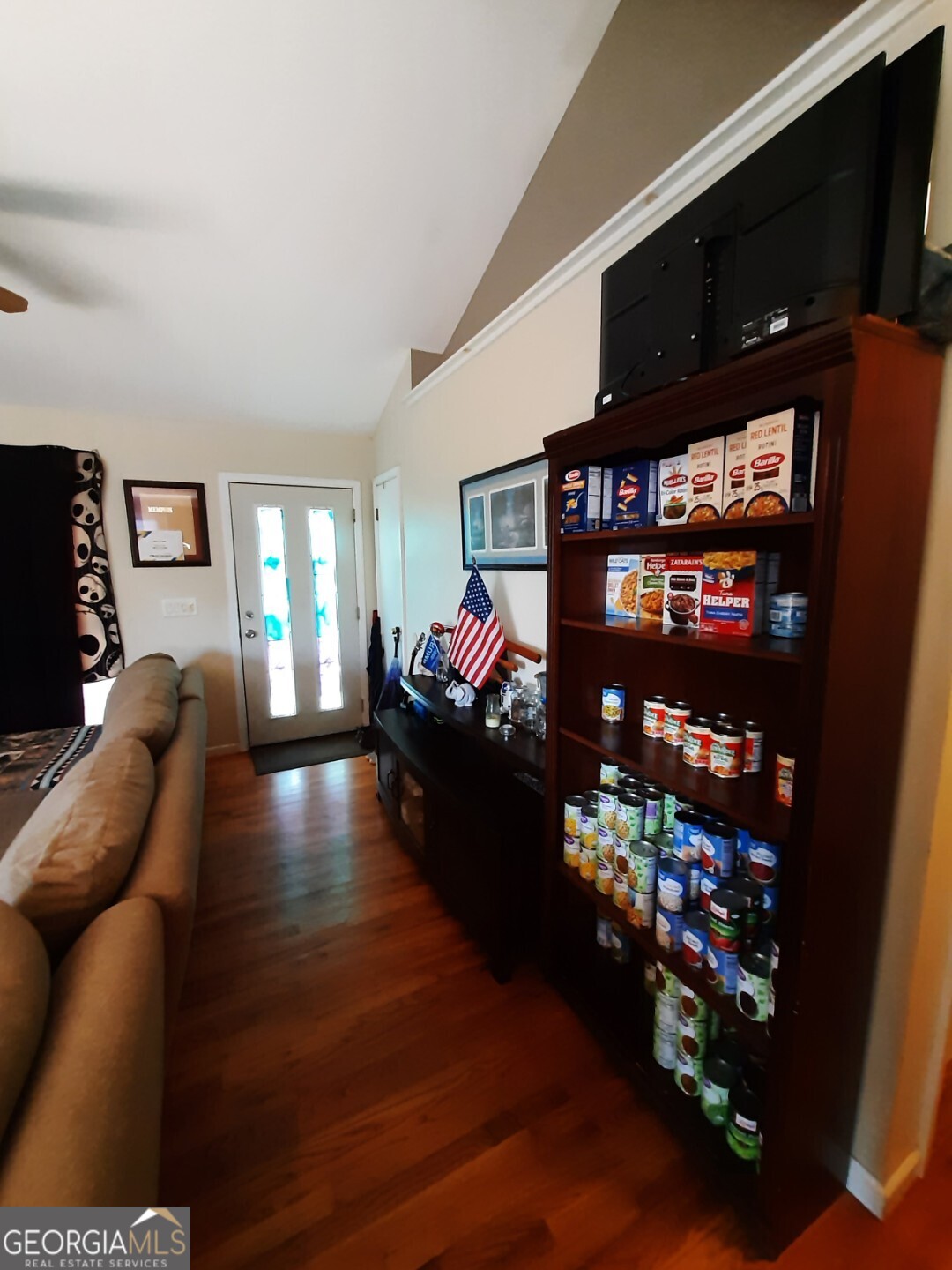 518 Eden Circle Cleveland, GA 30528 - Photo 12 of 20 a living room with fireplace furniture and a flat screen tv