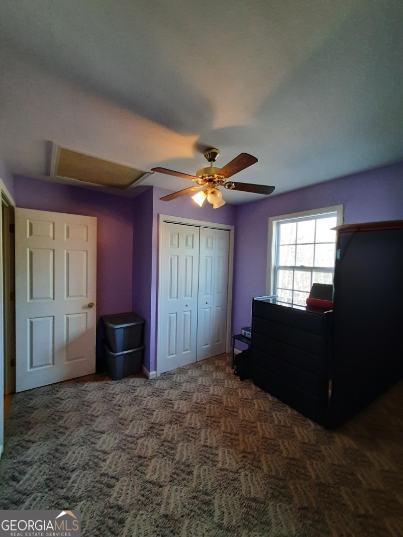 518 Eden Circle Cleveland, GA 30528 - Photo 20 of 20 a living room with furniture and a window