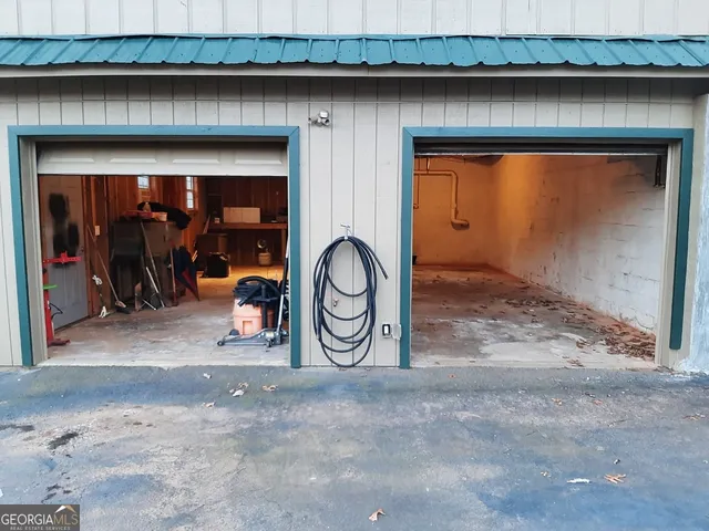 a view of room with wooden floor