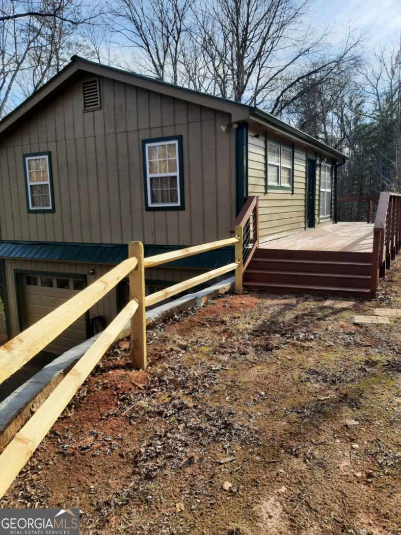 518 Eden Circle Cleveland, GA 30528 - Photo 4 of 20 a front view of a house with a yard