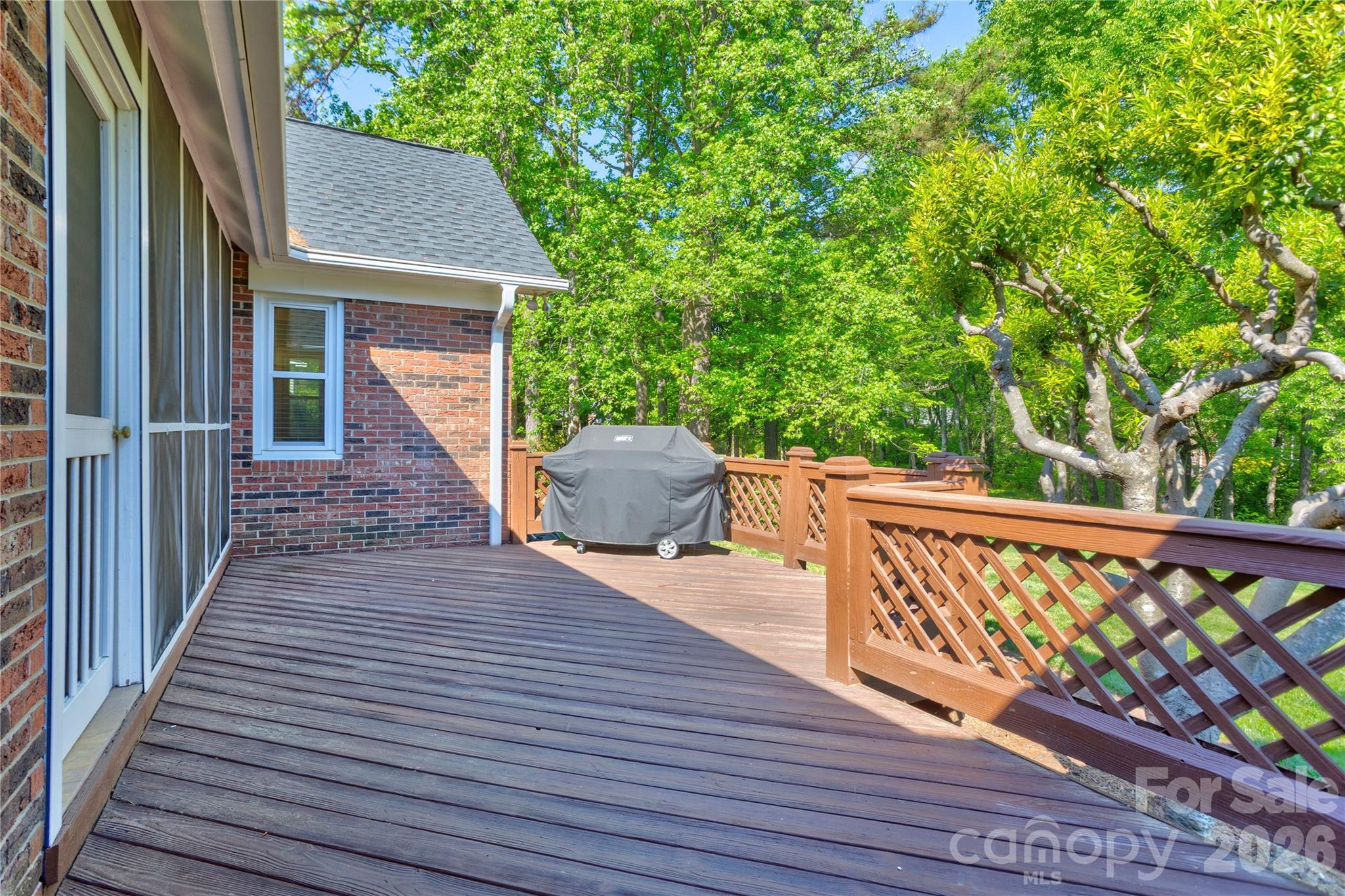 1188 Fawn Ridge Road Northwest Concord, NC 28027 - Photo 28 of 38 a balcony with wooden floor and outdoor space