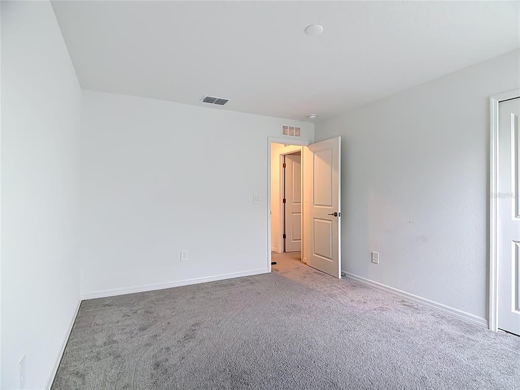 1633 Red Loop Lakeland, FL 33801 - Photo 32 of 60 a view of an empty room and window