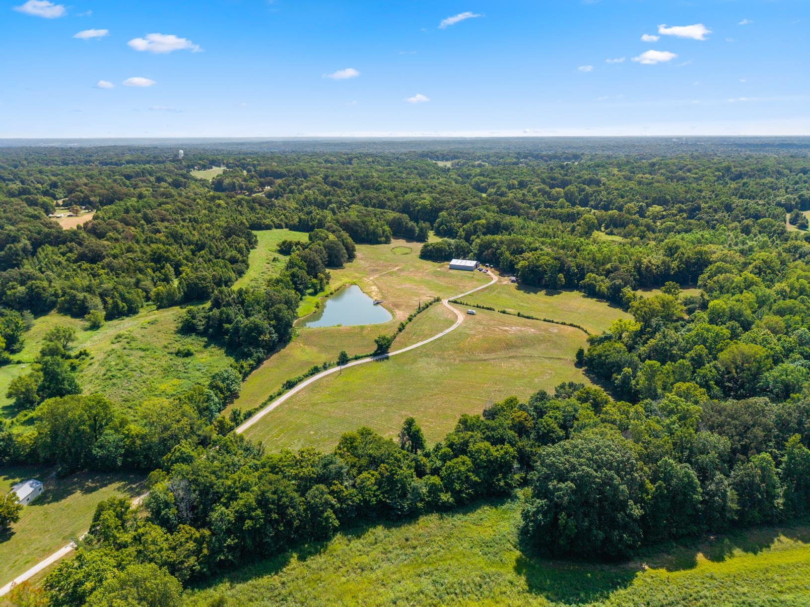8508 Campground Road Drummonds, TN 38023 - Photo 2 of 31 a view of a lake with a yard