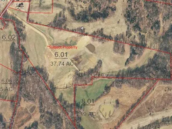 a sign that is on a brick wall