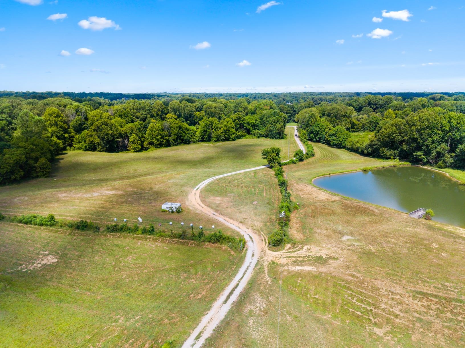 8508 Campground Road Drummonds, TN 38023 - Photo 3 of 31 a view of a swimming pool with a yard