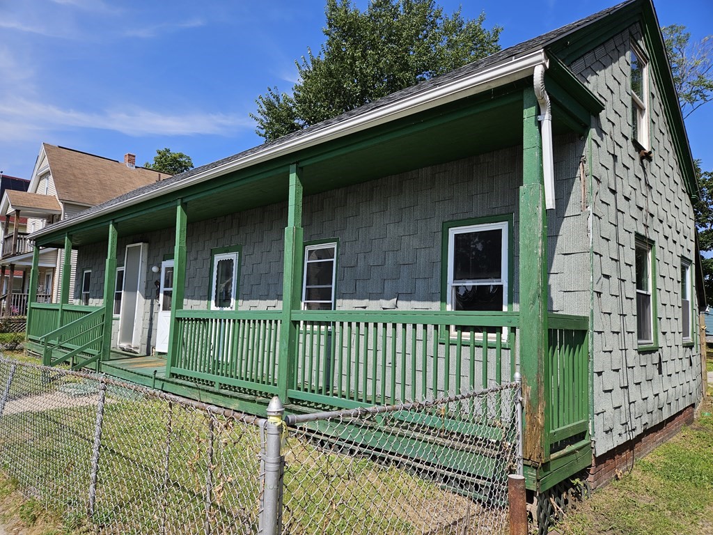 118 Tyler Street Springfield, MA 01109 - Photo 1 of 15 front view of a house with a small yard