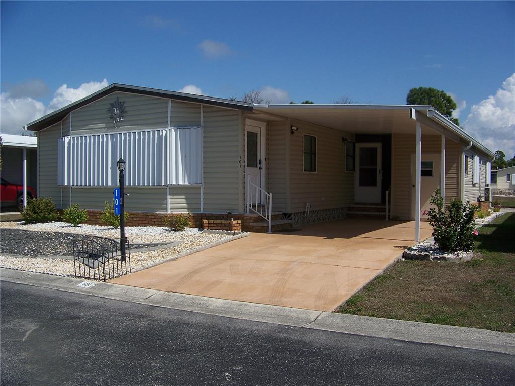 a front view of a house with a garage