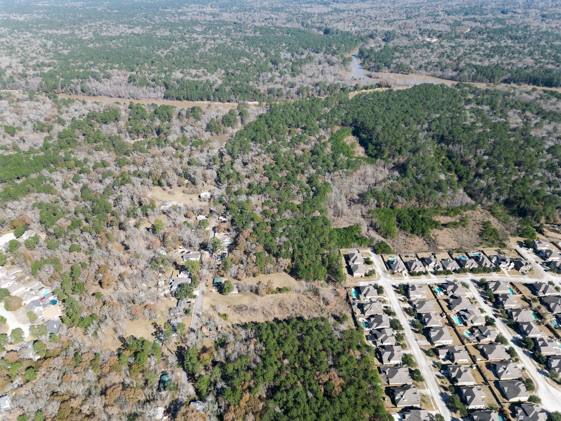 9 Dunnam Road Kingwood, TX 77345 - Photo 17 of 42 a view of a green field