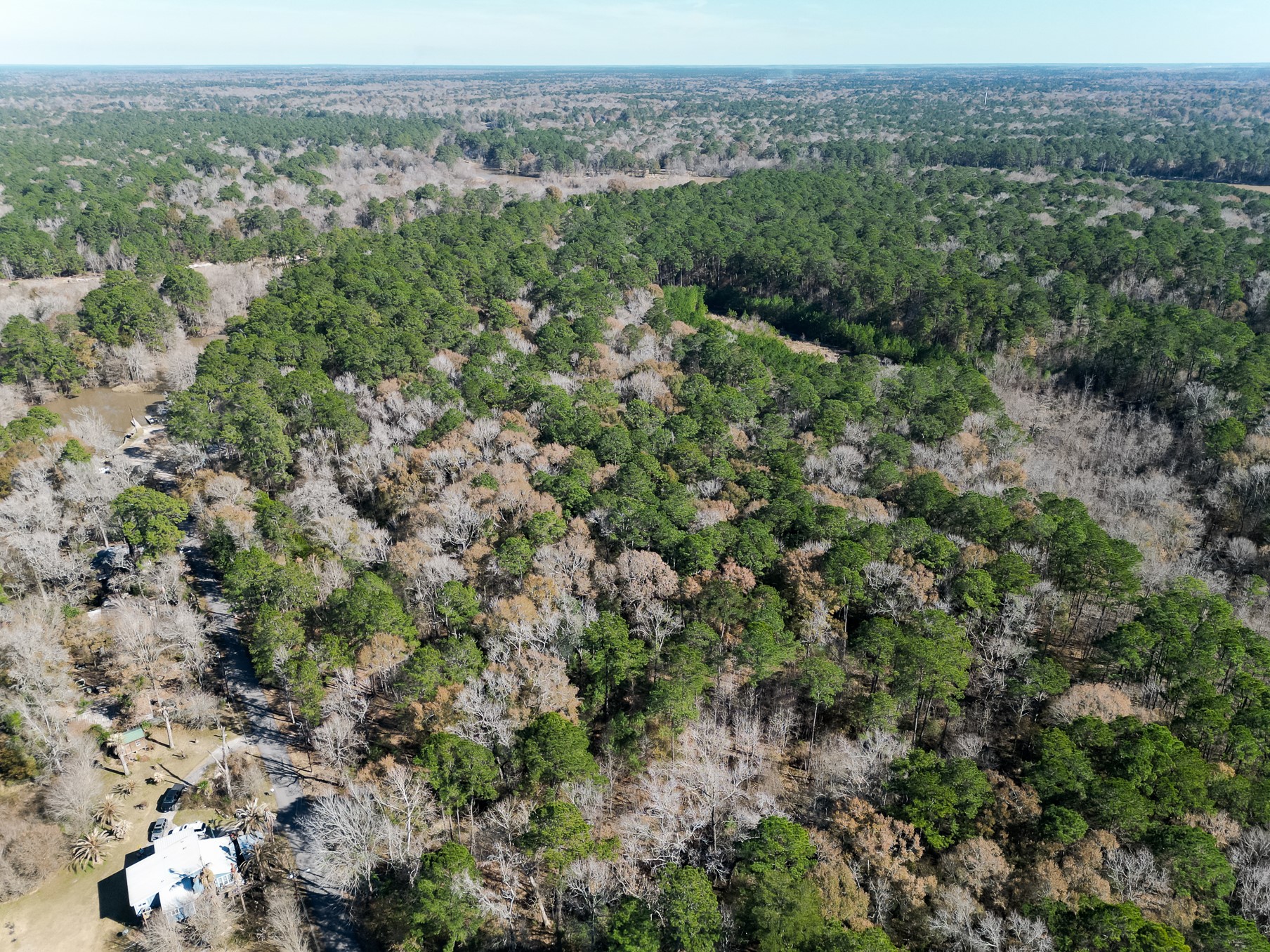 9 Dunnam Road Kingwood, TX 77345 - Photo 35 of 42 an aerial view of a house with a yard