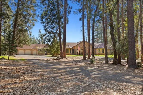a view of a house with a swimming pool