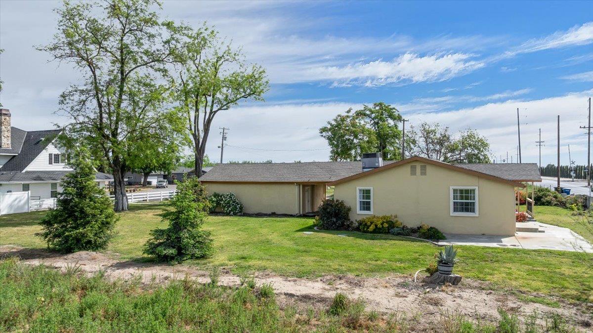607 East Keyes Road Ceres, CA 95307 - Photo 36 of 46 view of property exterior featuring a patio and stucco siding