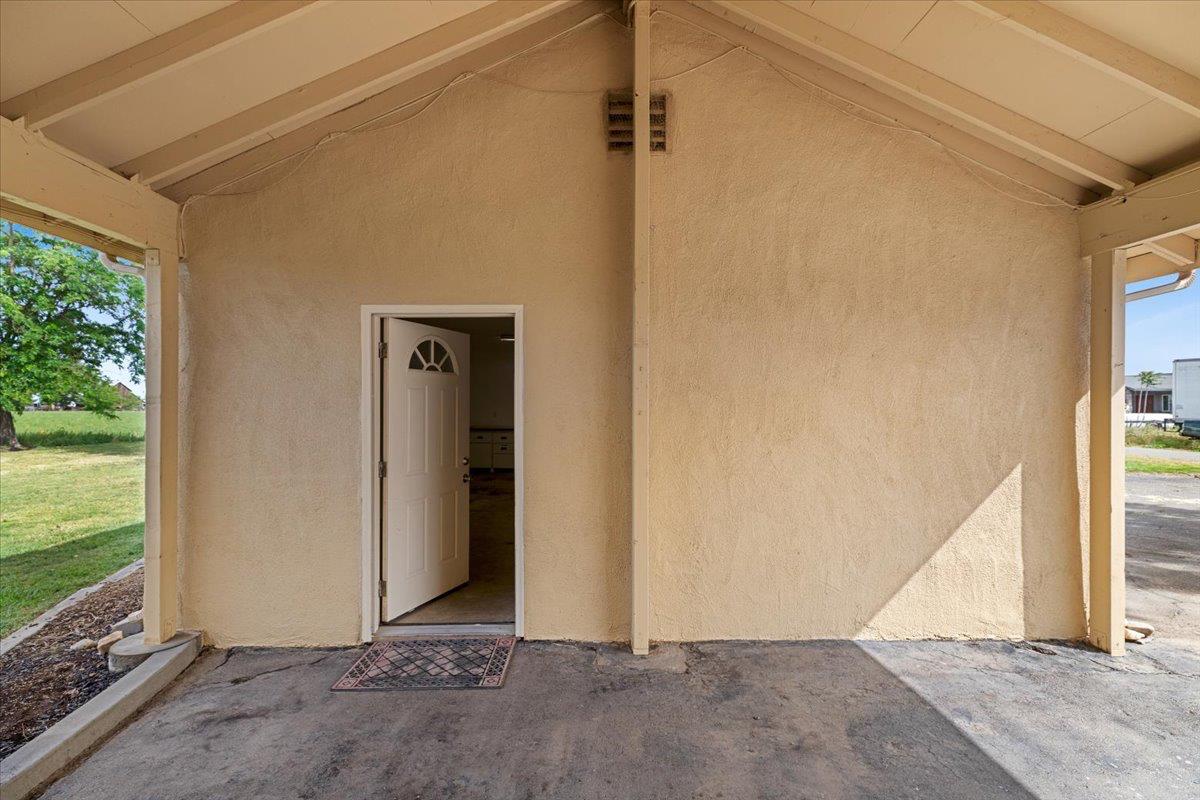 607 East Keyes Road Ceres, CA 95307 - Photo 41 of 46 doorway to property with stucco siding and a patio area
