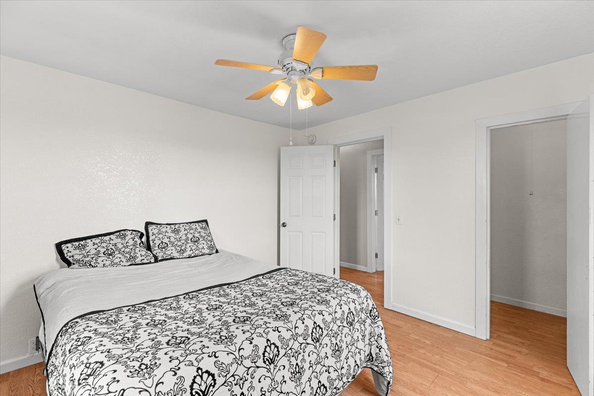 607 East Keyes Road Ceres, CA 95307 - Photo 42 of 46 bedroom with light wood-style floors and ceiling fan