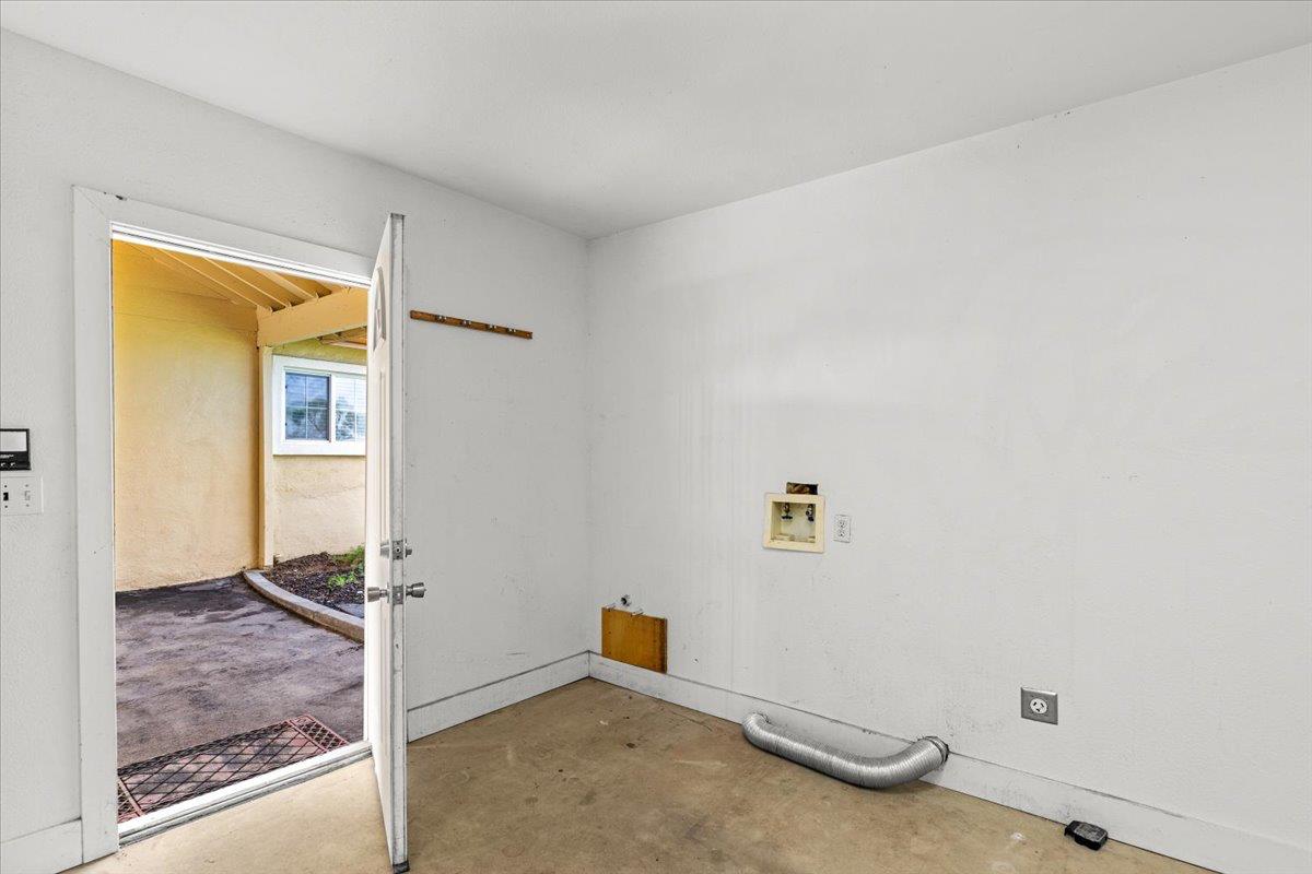 607 East Keyes Road Ceres, CA 95307 - Photo 46 of 46 laundry room featuring concrete floors and washer hookup