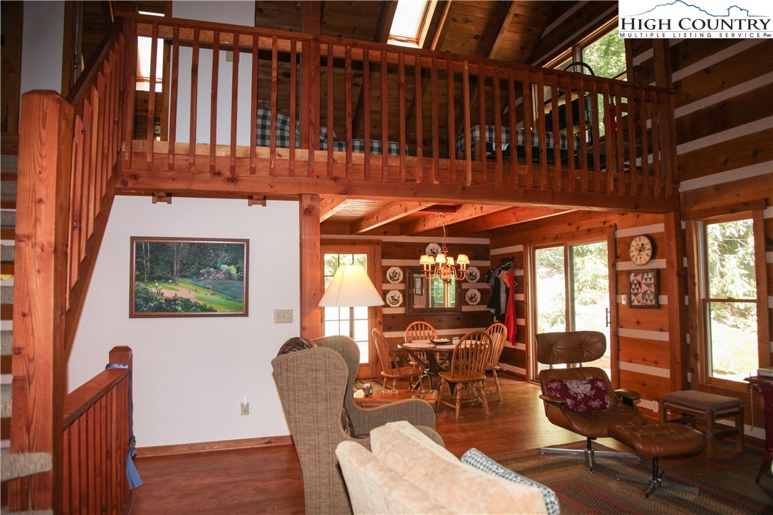 1288 Meadow Road Ferguson, NC 28624 - Photo 8 of 20 a dining room with furniture window and wooden floor