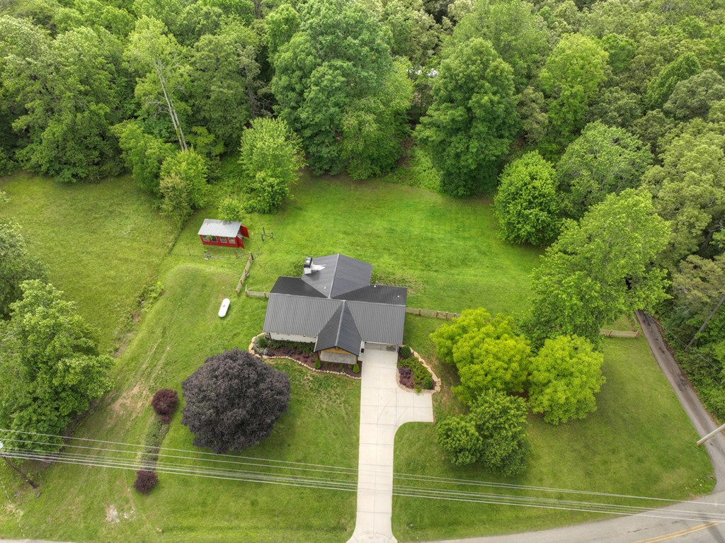 975 Goss Road Epworth, GA 30541 - Photo 27 of 58 an aerial view of a house with a yard basket ball court and outdoor seating